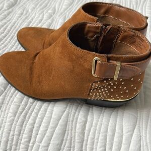 Brown ankle booties with gold stud accents